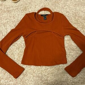 Long sleeve orange top. Size S. New with tags.